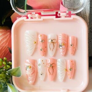 Pink and White Press-On Nails with Gold Accents